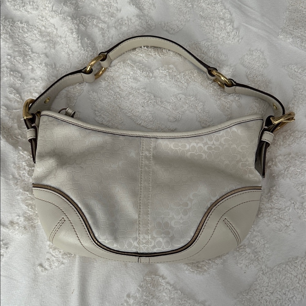 Coach Cream Leather Bag with beautiful gold accents and Pink Lining